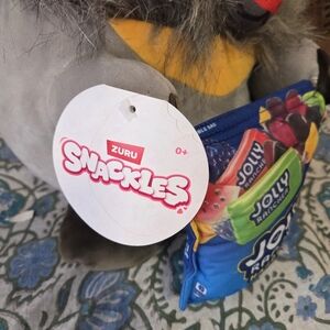 Zuru Snackles Plush with Colorful Jolly Candy Bag